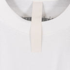 White crew-neck T-shirt neckline and inner neck tape detail
