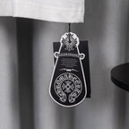 White shorts with black hanging apparel tag