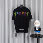 Black short-sleeve T-shirt with neon pixel graphic across back.