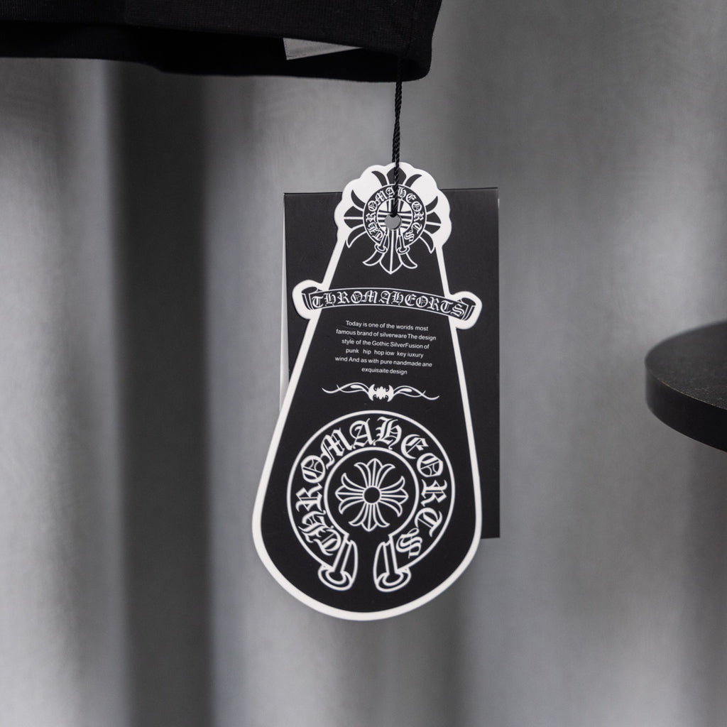 Black T-shirt with hanging white logo price tag