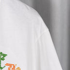 White short-sleeve T-shirt with smooth shoulder seam and knit texture