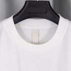 White crewneck T-shirt with black collar trim and neck label detail