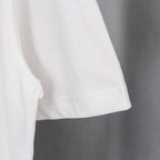 White short-sleeve T-shirt with curved hem and visible side seam