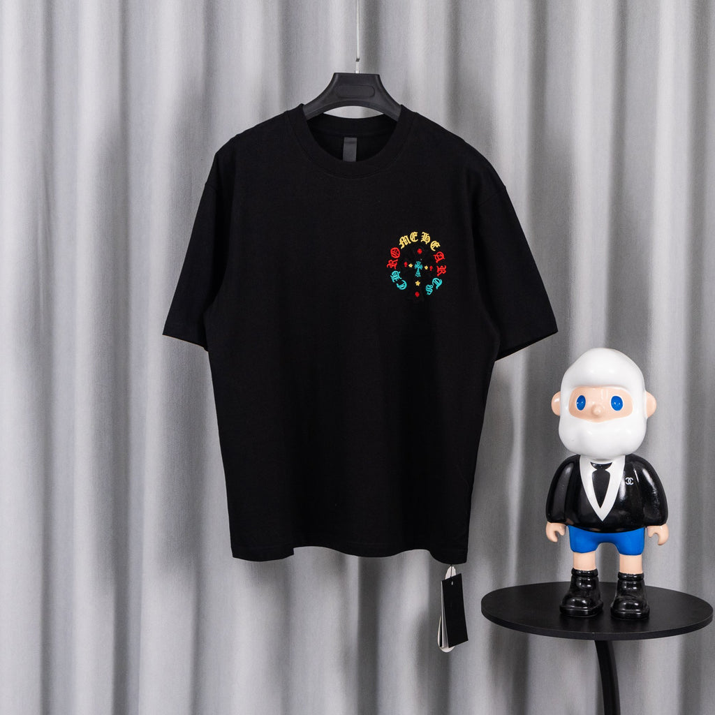 Black short-sleeve T-shirt with small colorful circular cross graphic on chest
