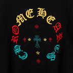Black T-shirt with embroidered-style multicolor circular cross graphic