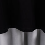 Black T-shirt lower hem with rounded cut and stitched edge