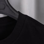 Black short-sleeve T-shirt shoulder seam detail