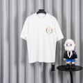 White short-sleeve T-shirt with colorful circular graphic on chest.