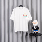 White short-sleeve T-shirt with colorful circular graphic on chest.