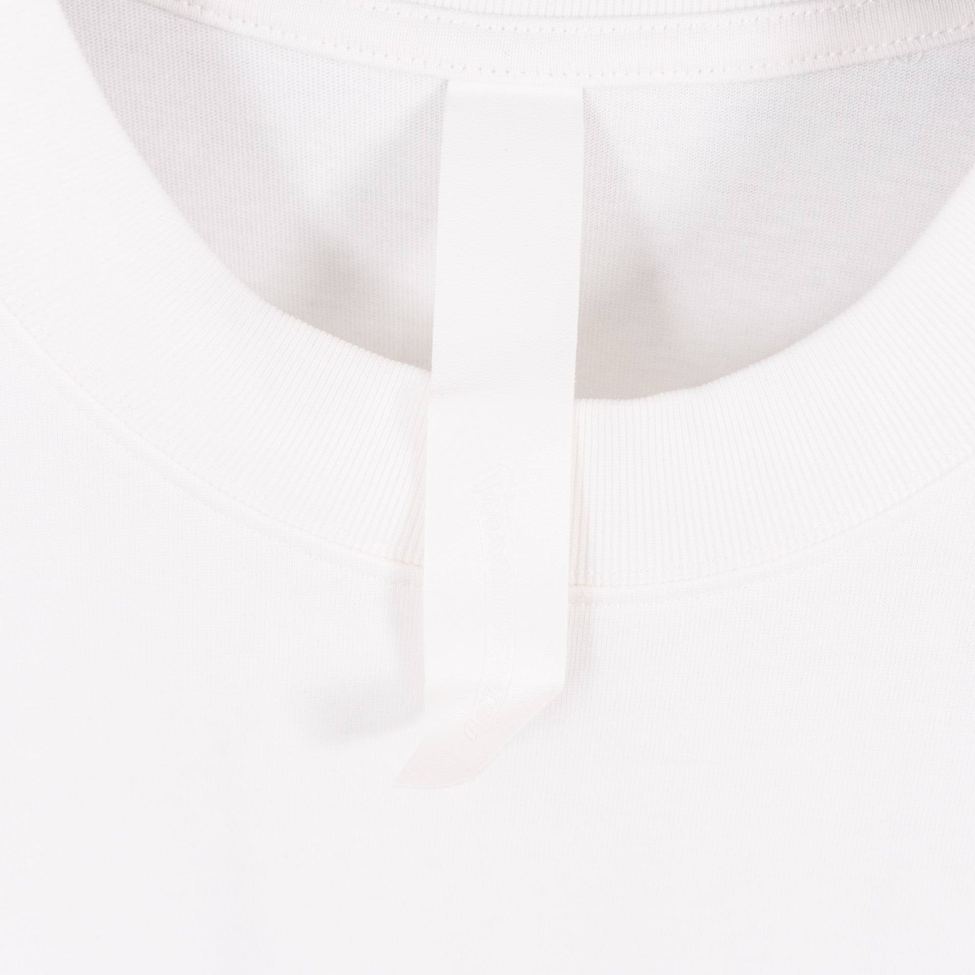 White T-shirt ribbed crew neck with stitched inner neck tape.