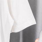 White T-shirt sleeve and curved hem