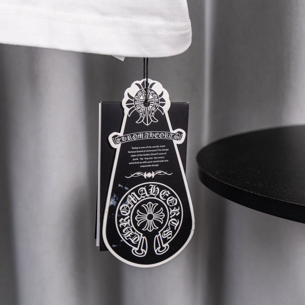 White short-sleeve T-shirt with black and white hanging tag
