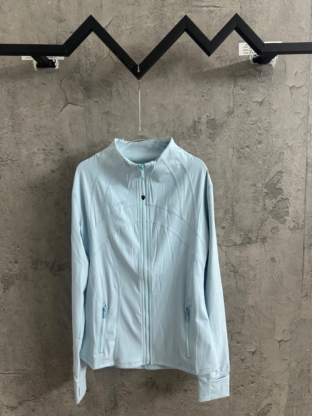 Ralph Lauren light blue zip-up jacket with stand collar and long sleeves