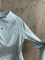 Ralph Lauren light blue zip-up jacket sleeve with center-front zipper detail