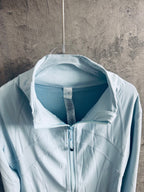 Ralph Lauren light blue zip-up jacket interior view of stand collar and zipper