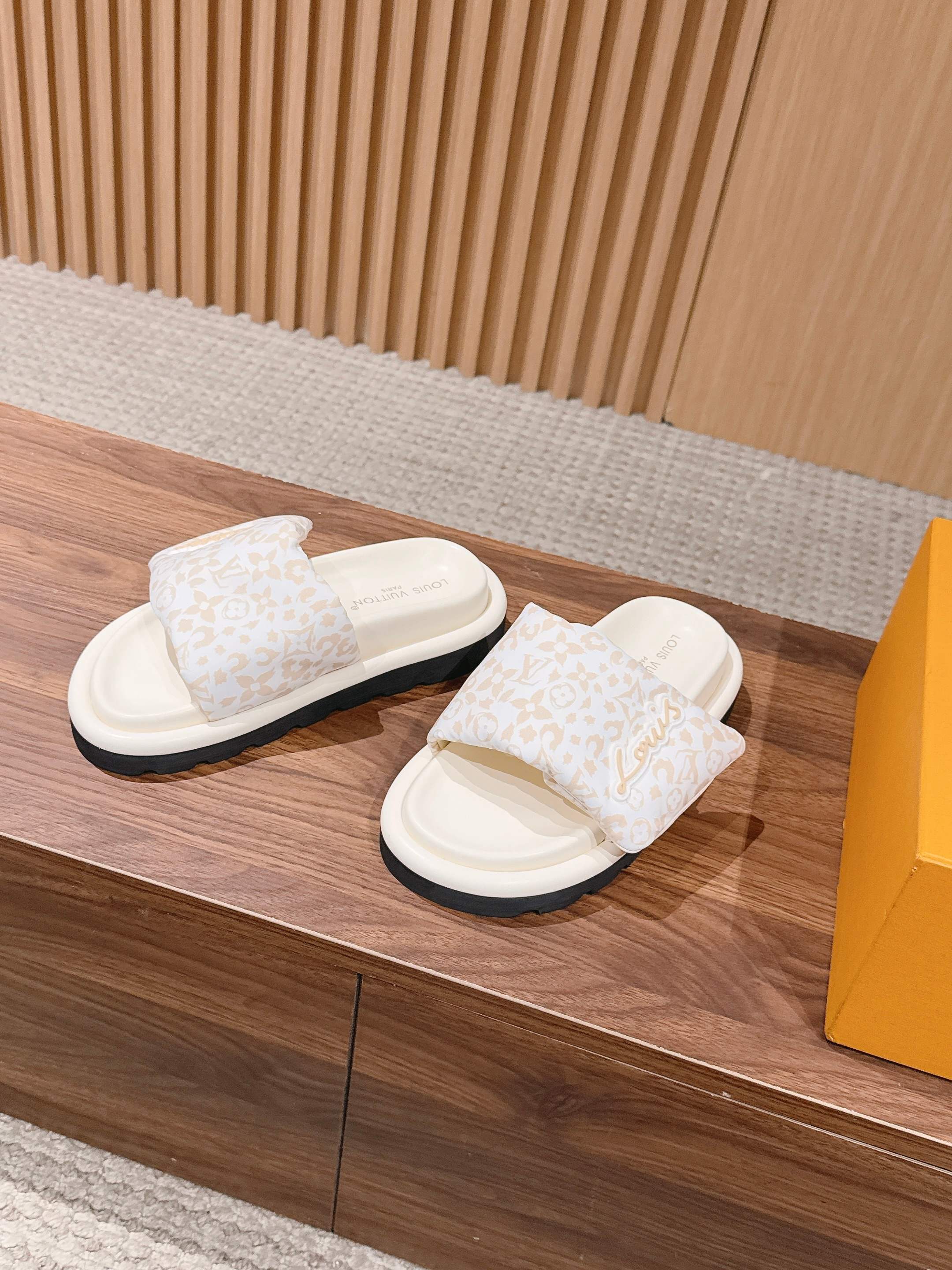 Louis Vuitton slide sandals, white patterned cross strap with cushioned sole