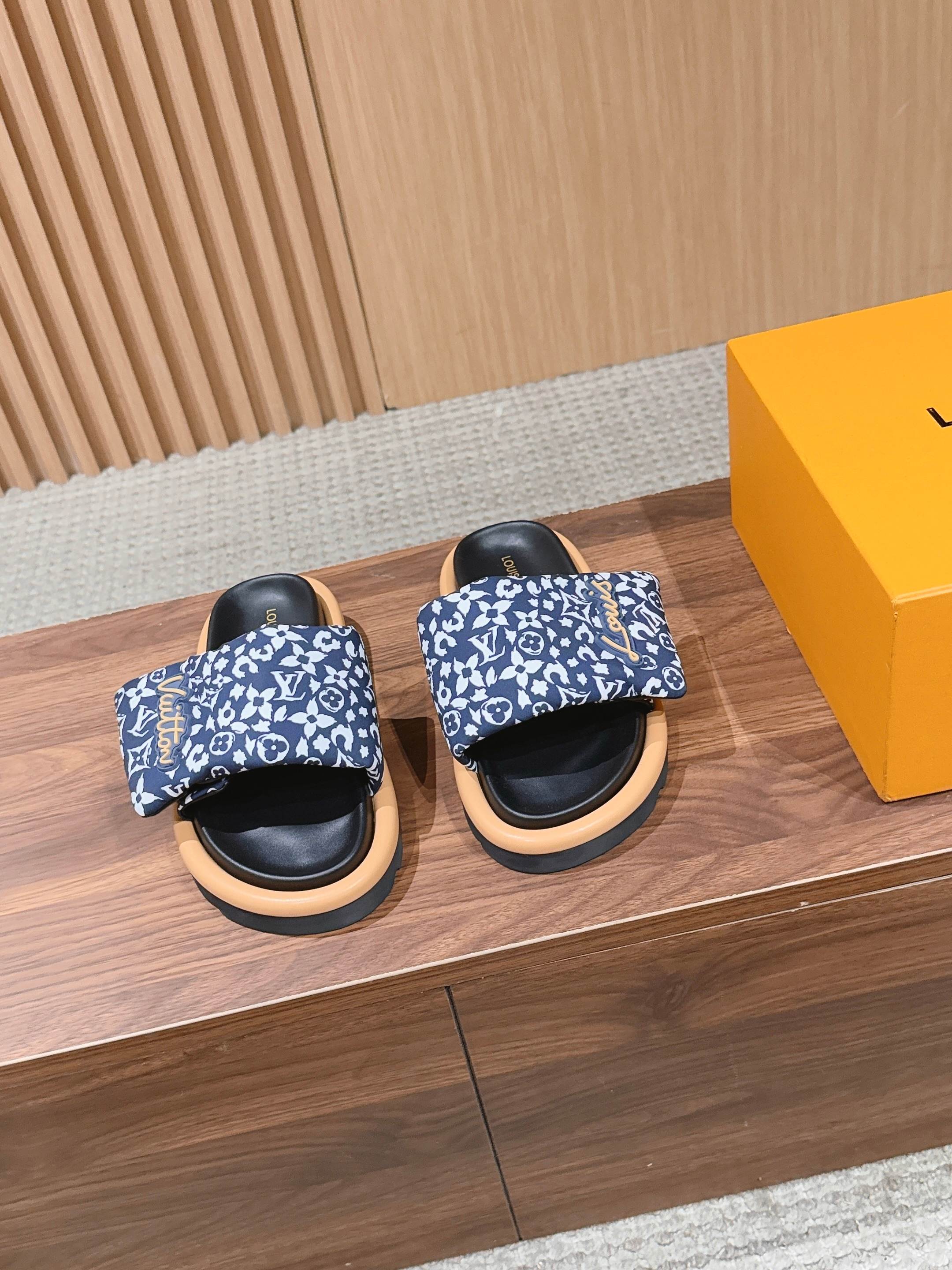 Louis Vuitton slide sandals, blue floral monogram print upper, black footbed, light rubber sole