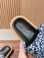 Louis Vuitton slide sandal, black logo footbed and blue floral monogram strap, light sole