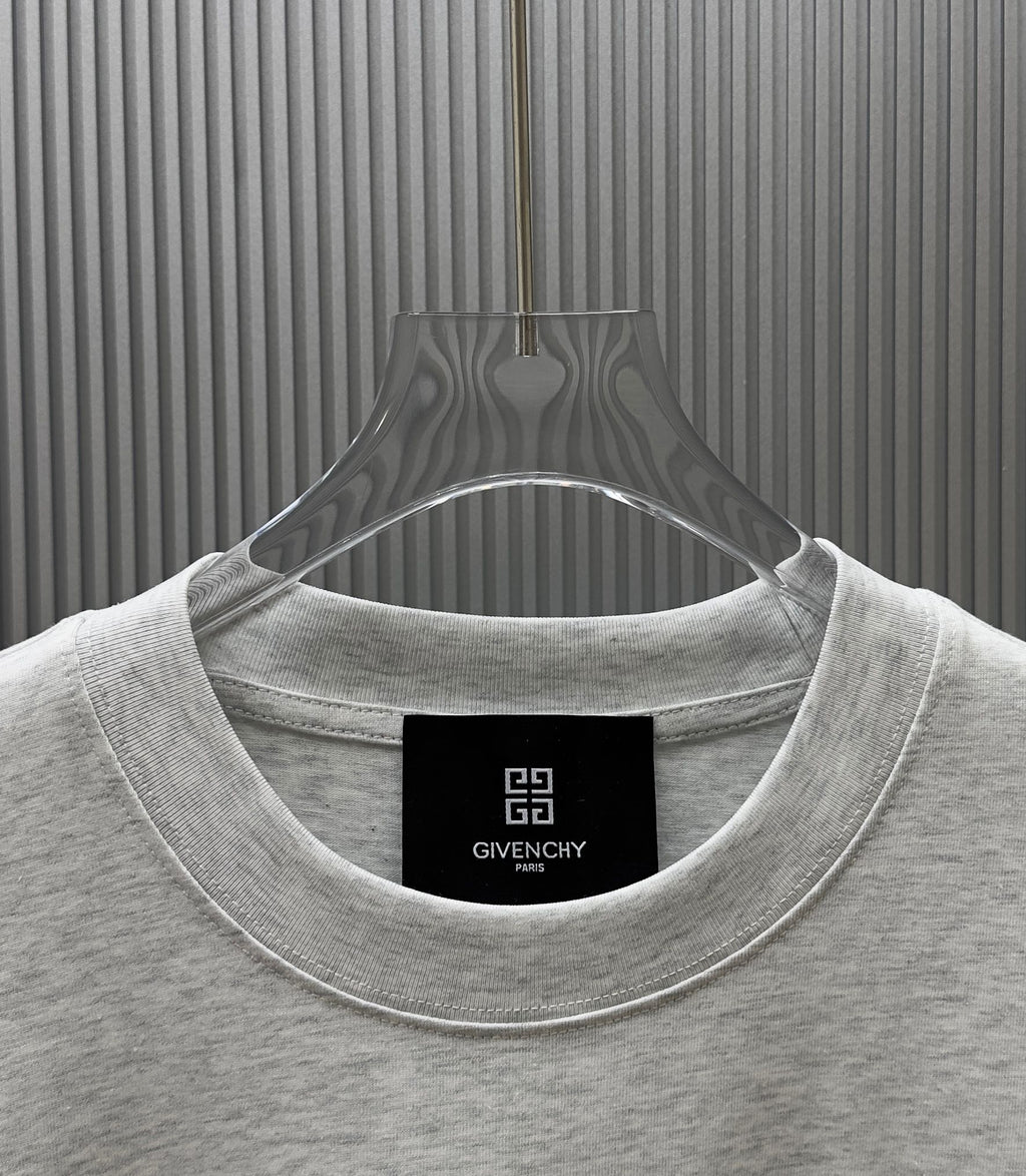 Light gray Givenchy crewneck T-shirt neckline close-up with inner tag