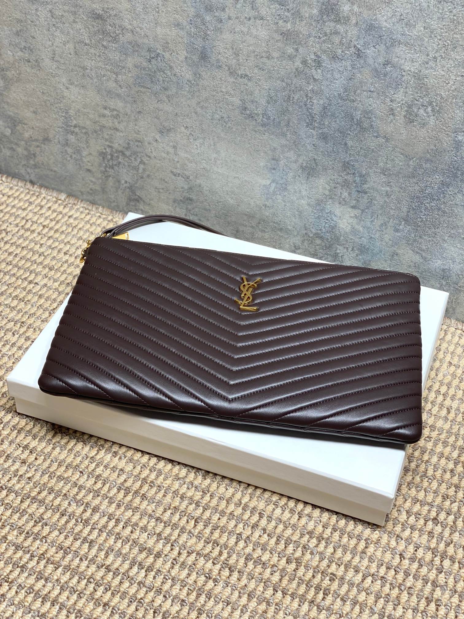 Quilted small YSL bag in dark brown with chevron texture and gold logo
