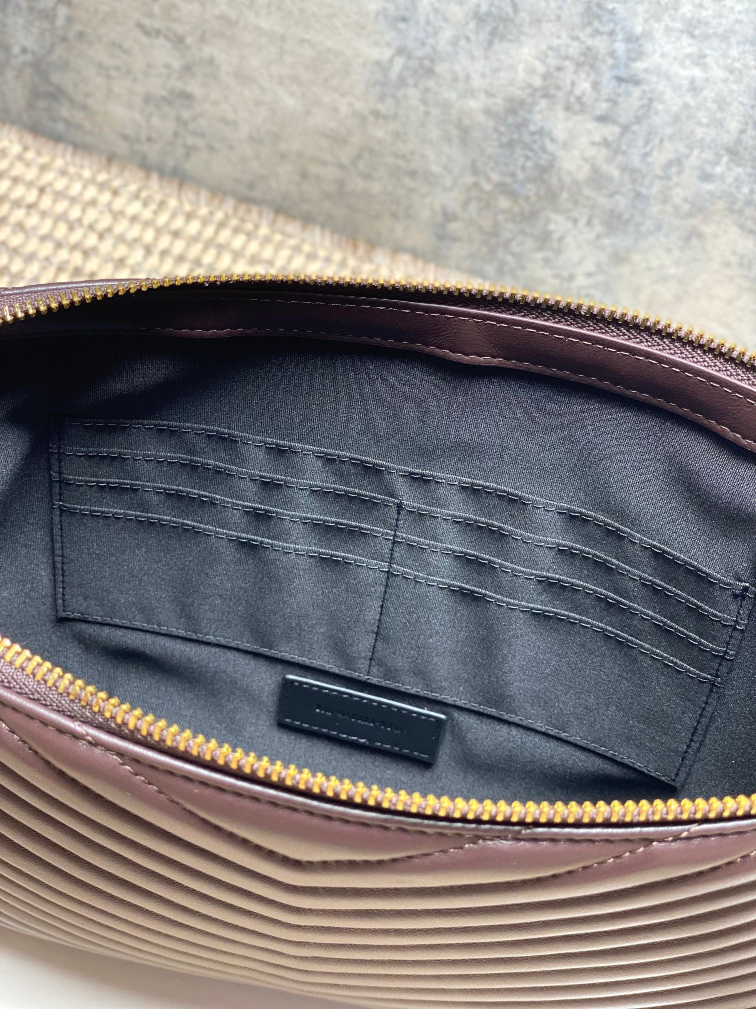 Small YSL bag interior lining with pocket and gold zipper