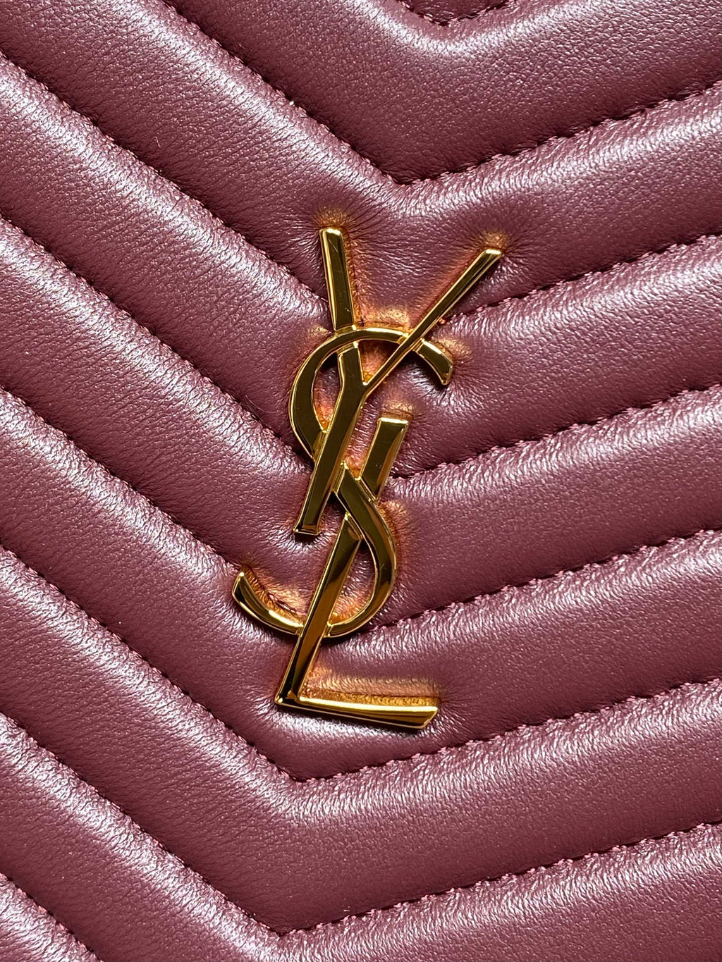 YSL logo on burgundy chevron quilted leather flap