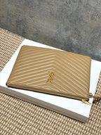 Tan small quilted bag with gold zipper trim and YSL logo front