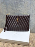 YSL small dark brown quilted handbag with chevron pattern, front YSL logo and wrist strap