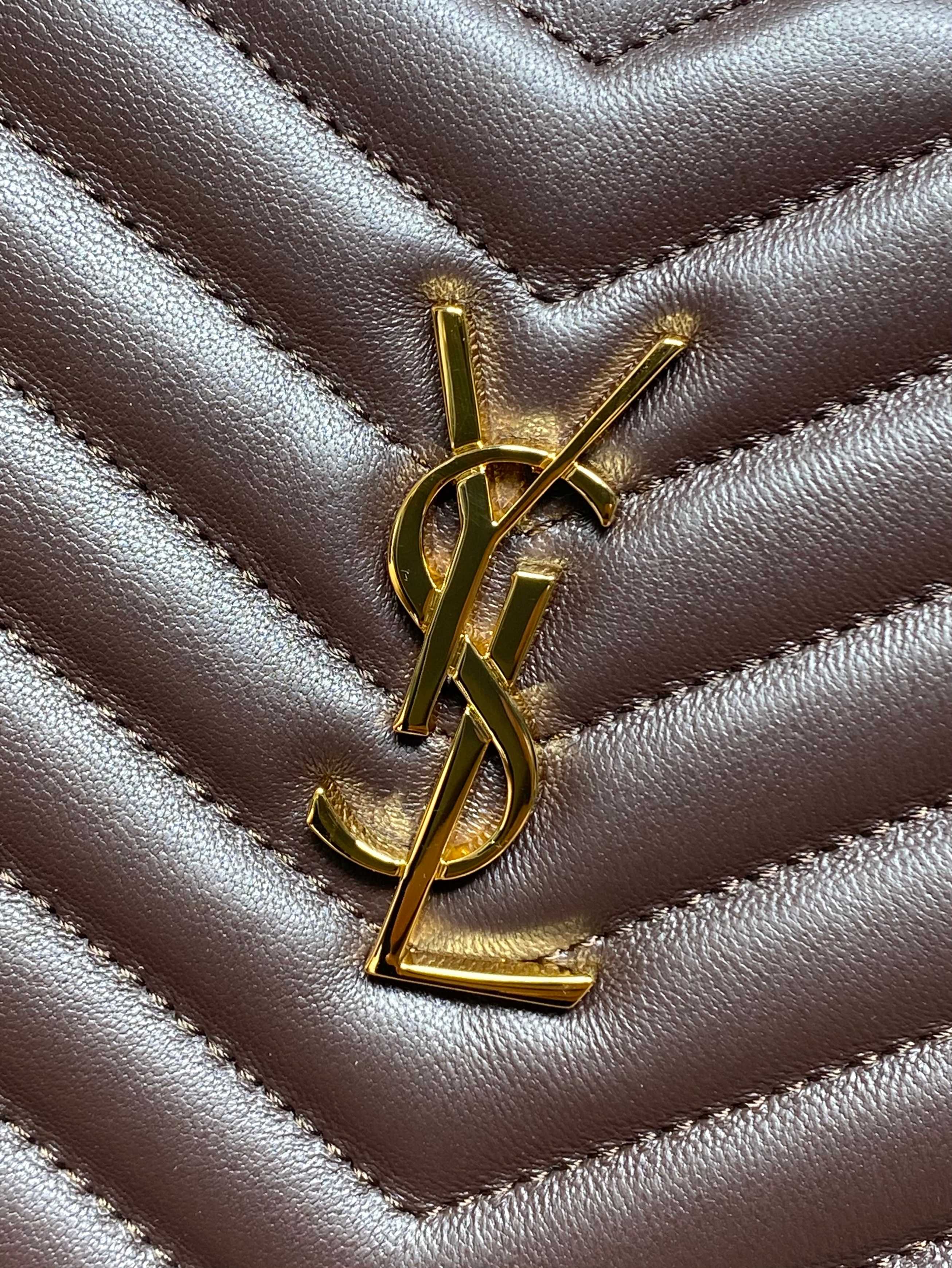 YSL logo hardware on dark brown quilted leather with chevron ridges