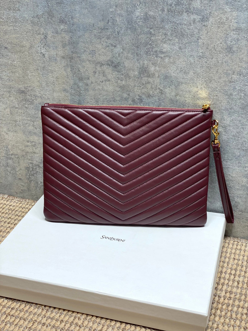 Burgundy quilted small shoulder bag with YSL logo and gold-tone side strap
