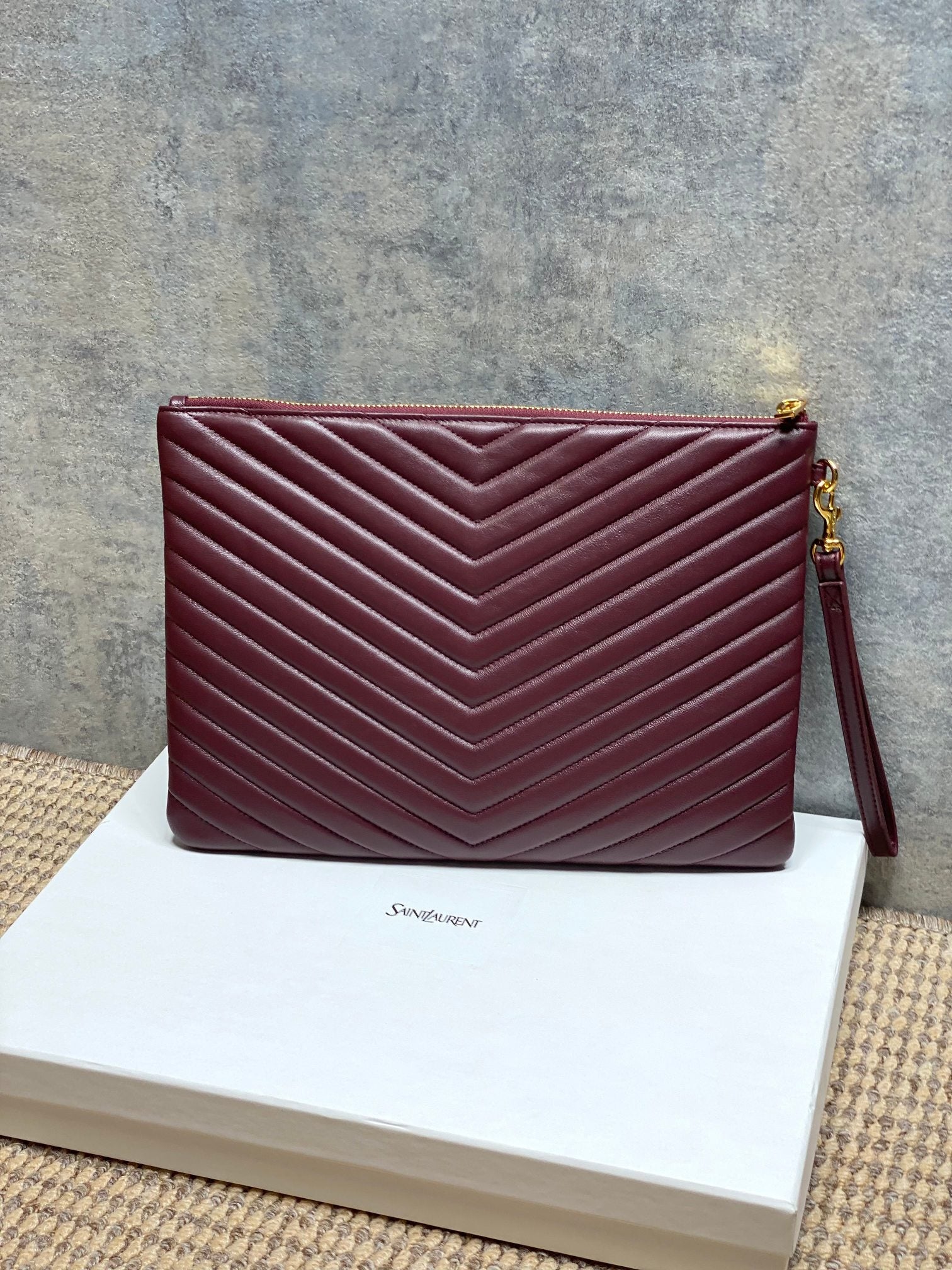 Burgundy quilted small shoulder bag with YSL logo and gold-tone side strap