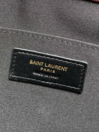 Black interior label reading SAINT LAURENT PARIS