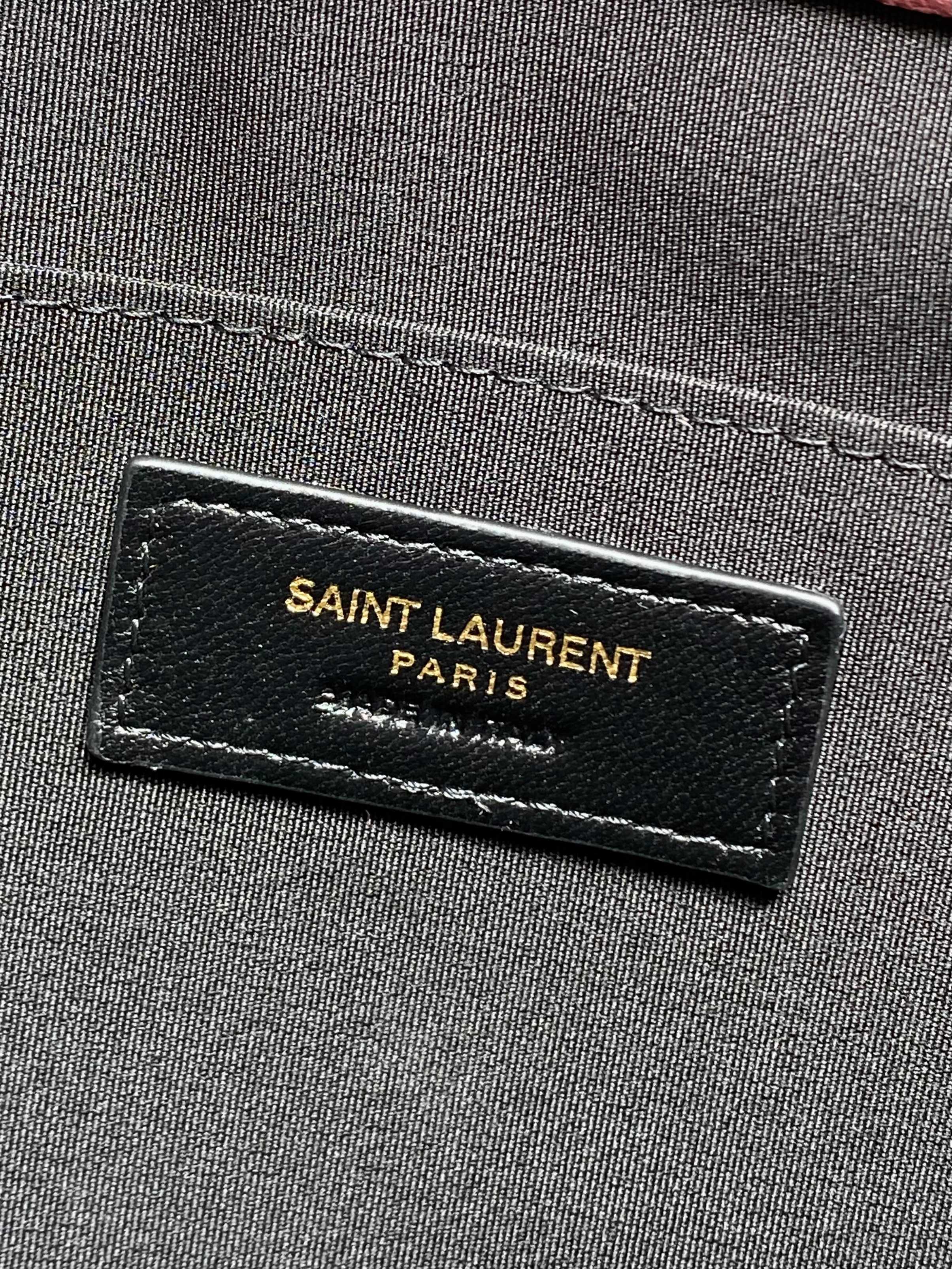 Black interior label reading SAINT LAURENT PARIS