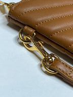 YSL tan leather bag strap with gold chain hardware and lobster clasp