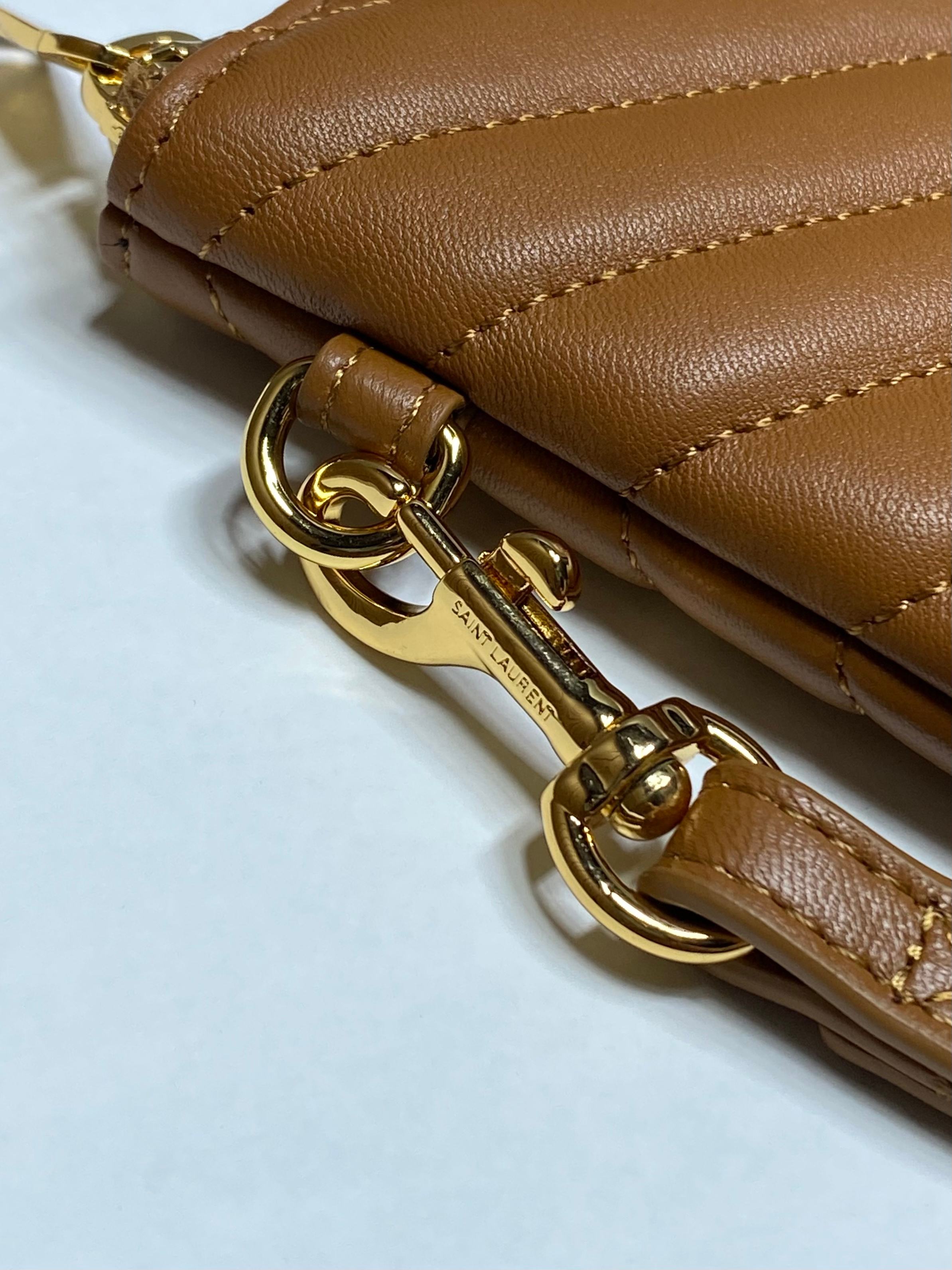 YSL tan leather bag strap with gold chain hardware and lobster clasp