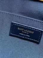 YSL bag interior label on navy lining, Saint Laurent PARIS text