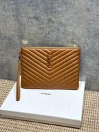 Chevron quilted leather clutch with YSL logo and top zipper, tan-brown.