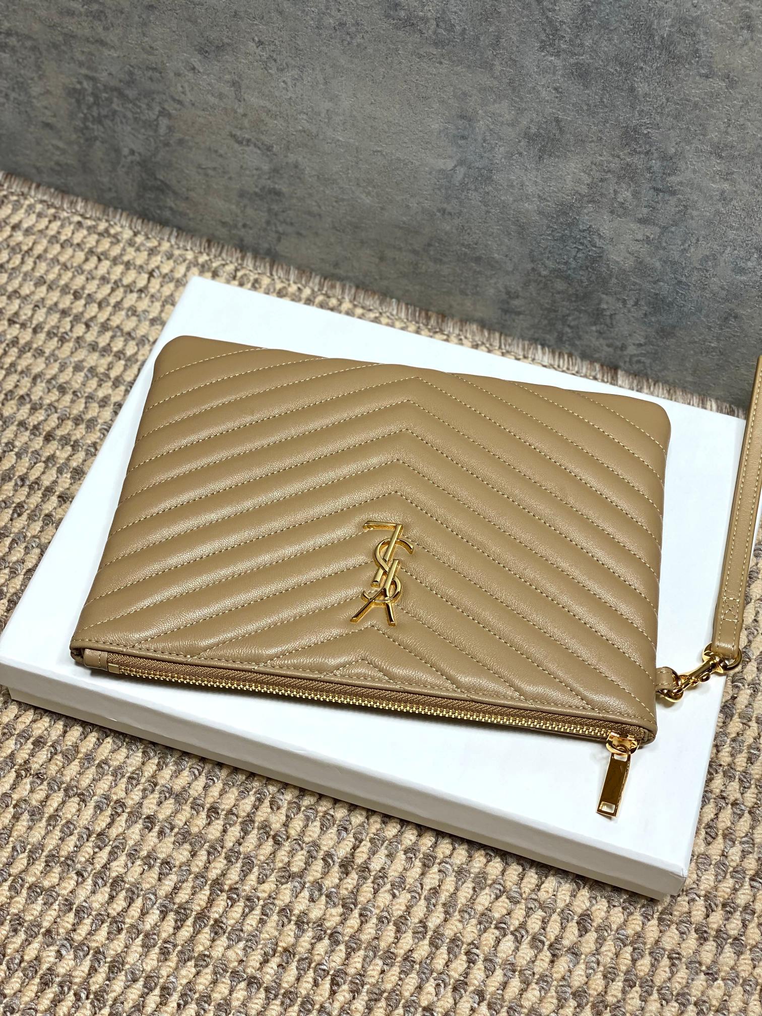 YSL small quilted bag back in tan with chevron pattern and gold zip pull