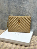 YSL small quilted bag in tan with chevron pattern, gold logo, and top zip closure