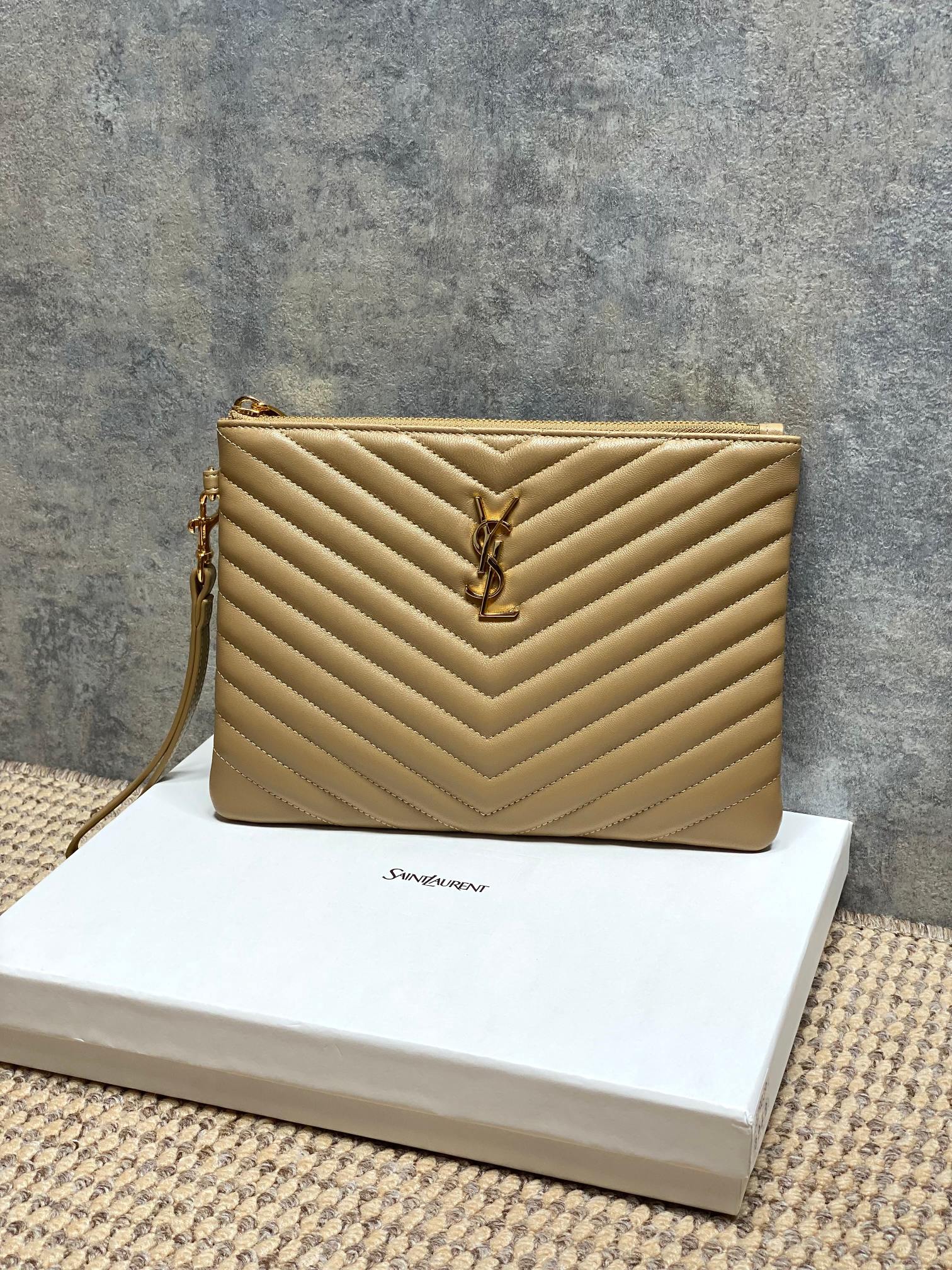 YSL small quilted bag in tan with chevron pattern, gold logo, and top zip closure