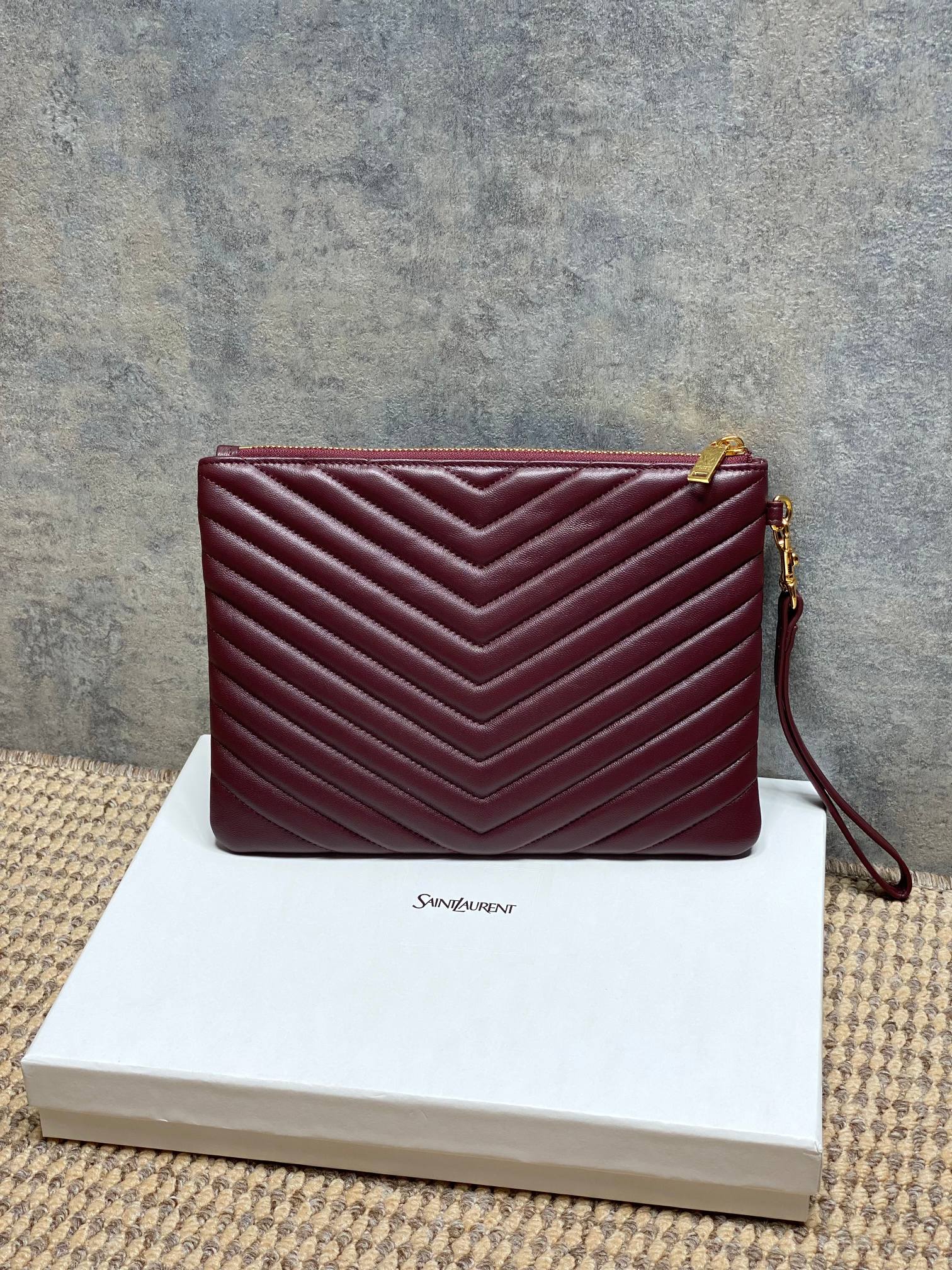Burgundy quilted small crossbody bag with front YSL logo and strap
