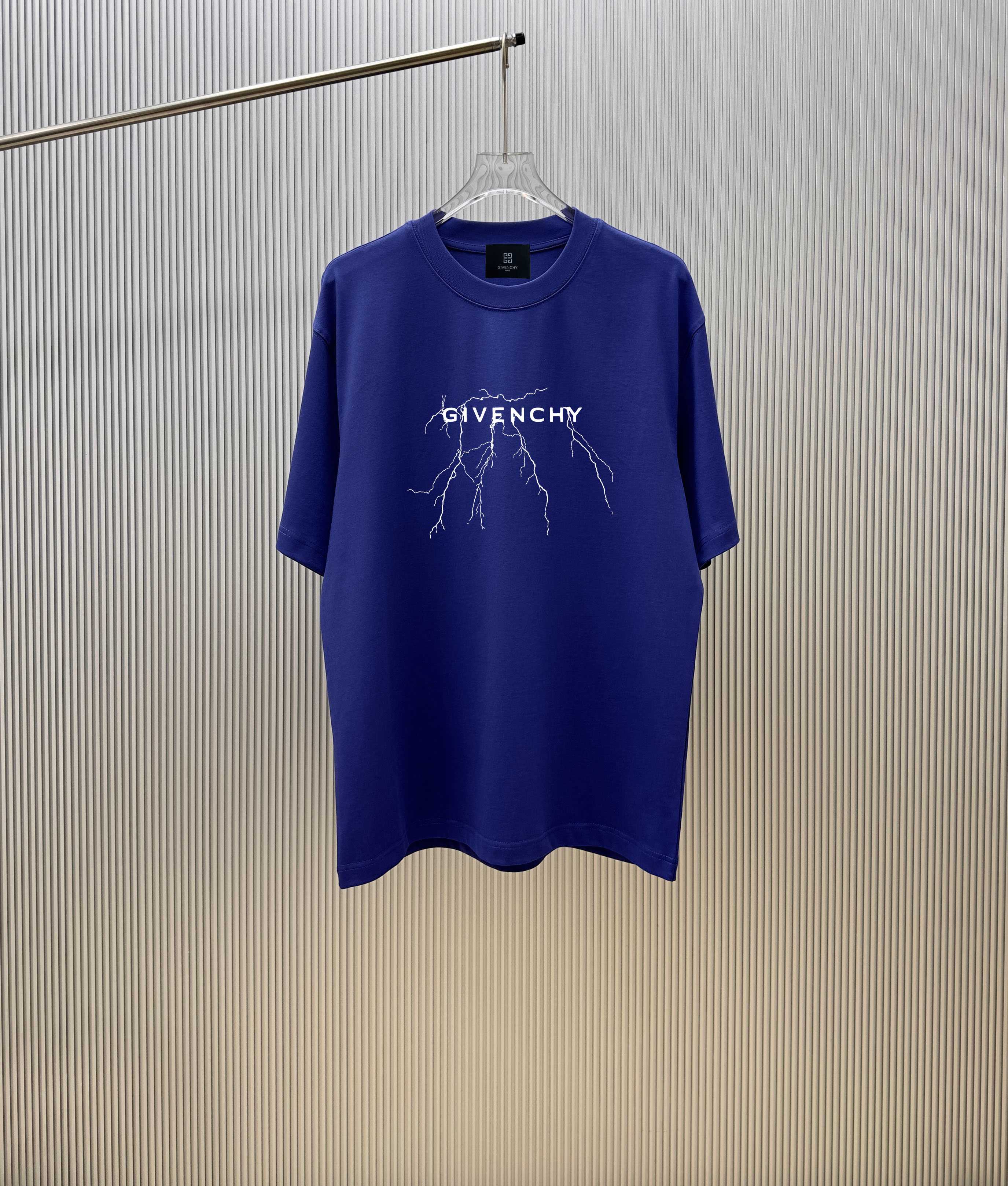 Blue Givenchy graphic T-shirt on hanger with crew neck