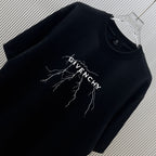 Black short-sleeve T-shirt close-up with GIVENCHY graphic logo print