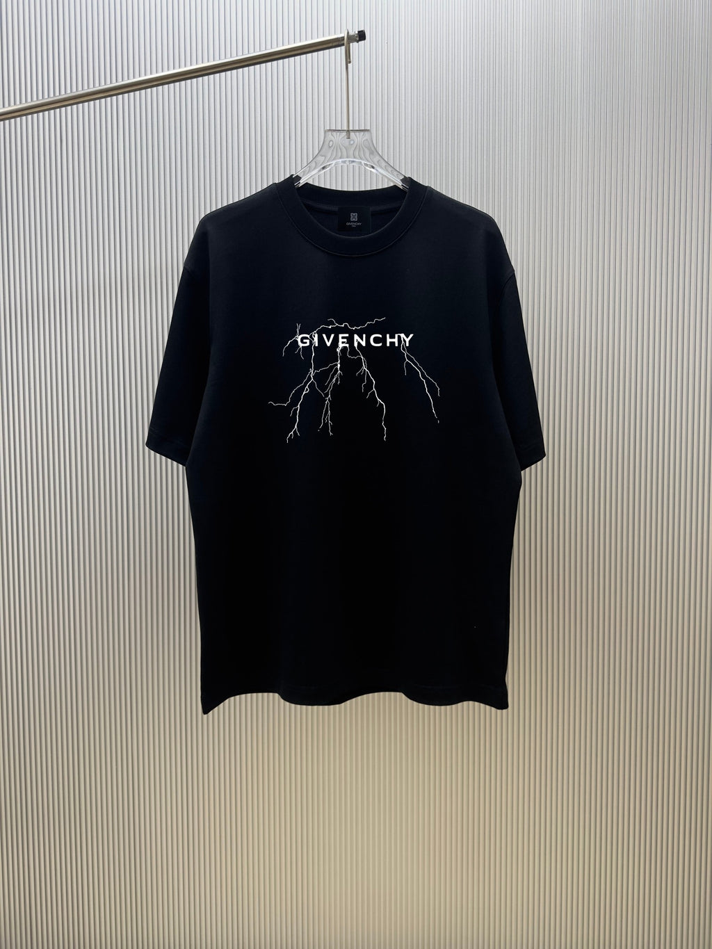 Black short-sleeve T-shirt with GIVENCHY graphic print at the chest