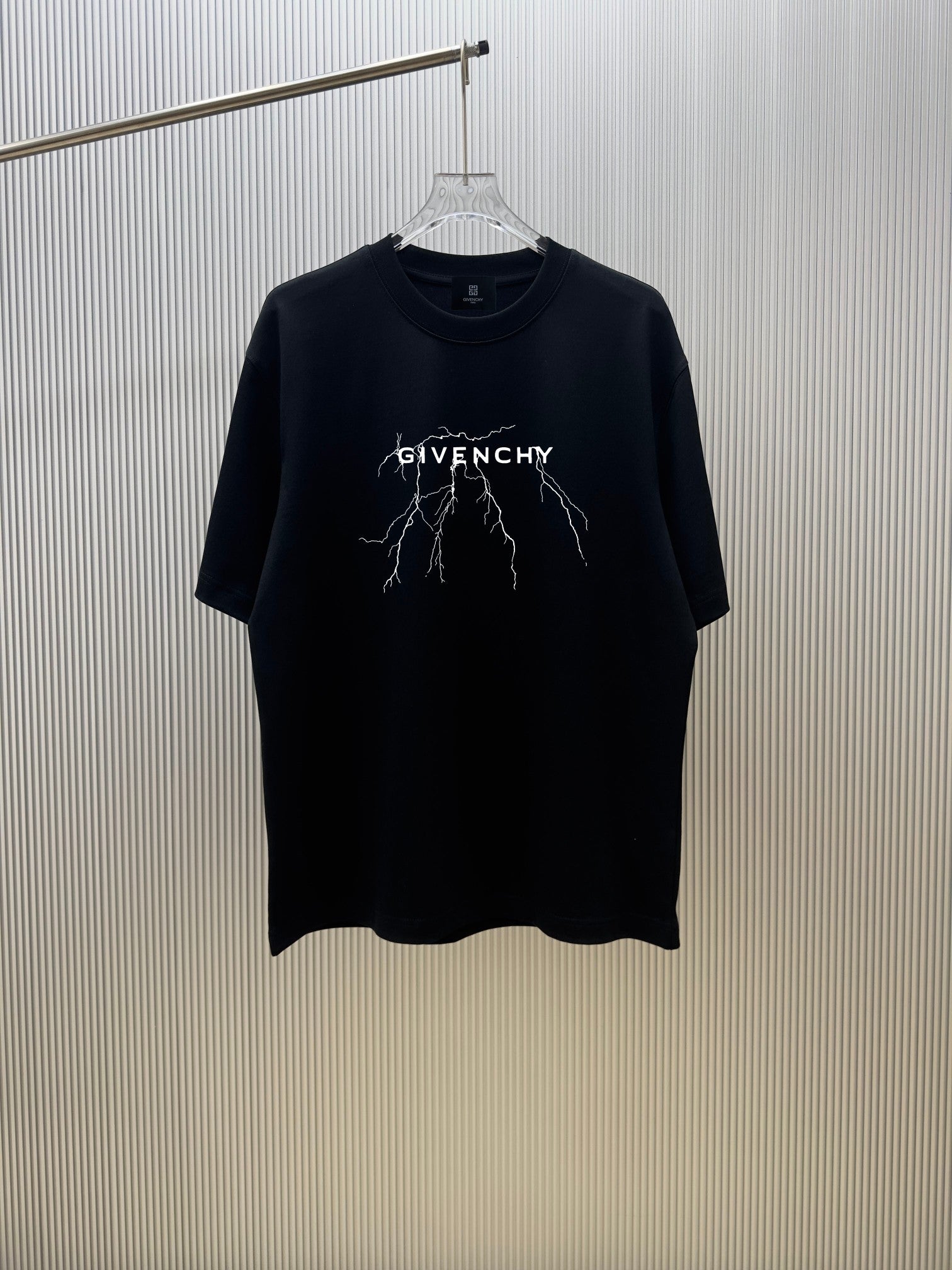 Black short-sleeve T-shirt with GIVENCHY graphic print at the chest