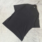 Balenciaga short-sleeve T-shirt, dark; angled flat-lay view without front graphic