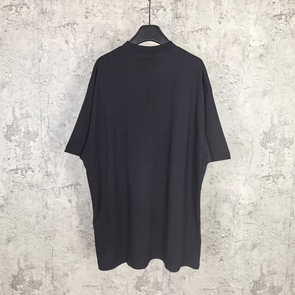 Balenciaga short-sleeve T-shirt, dark; plain back view on hanging display