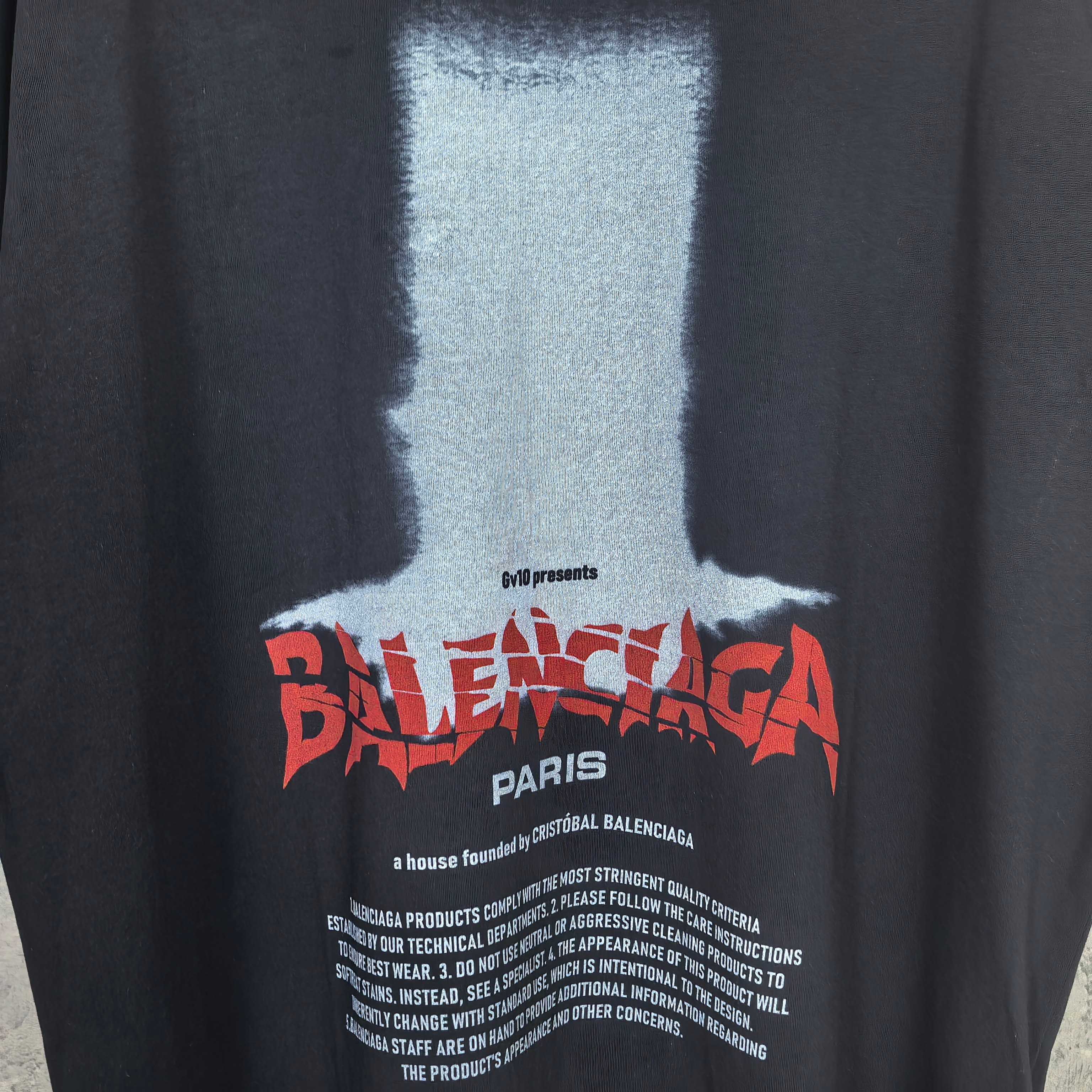 Balenciaga short-sleeve T-shirt; close-up of front print with red Balenciaga Paris text