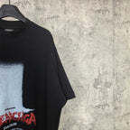 Balenciaga short-sleeve T-shirt; side view showing part of front graphic and Paris logo