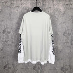 Off-white long T-shirt, crew neck, graphic text on both sleeves, plain back